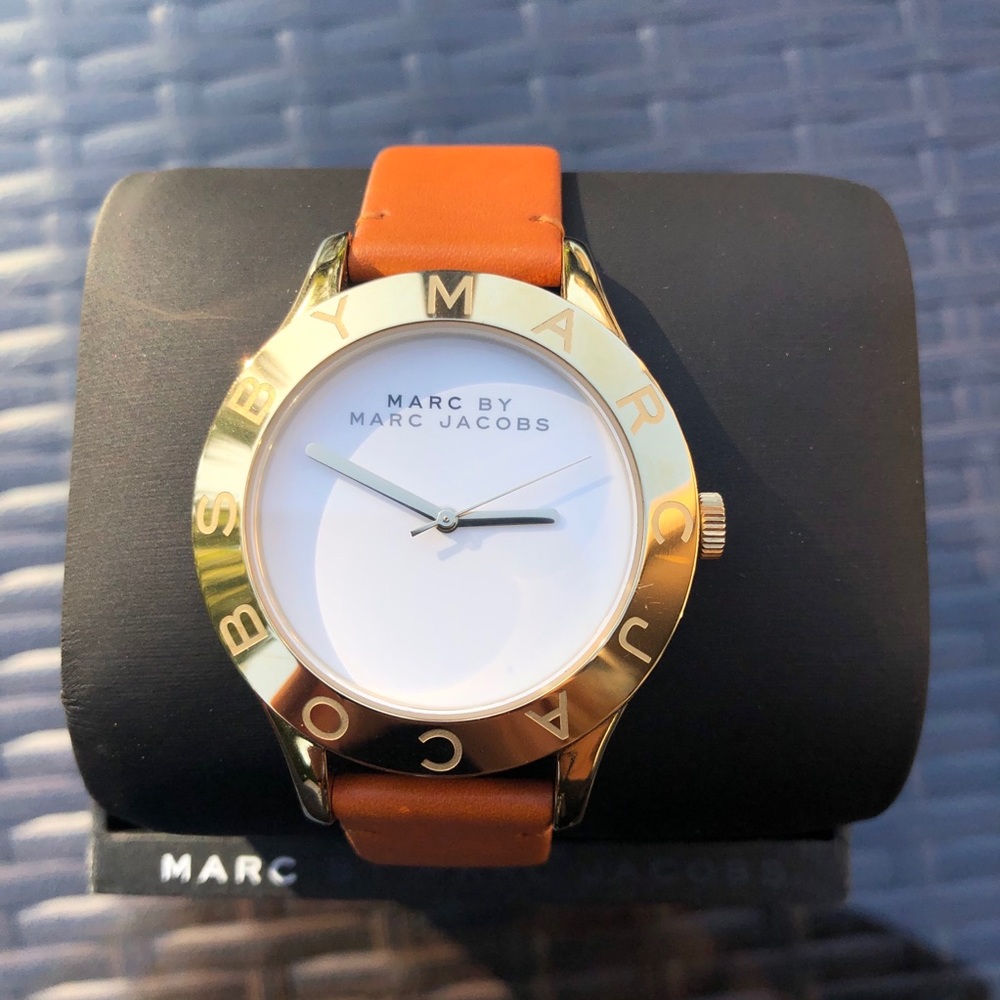 Women’s brown leather and gold marc jacobs watch